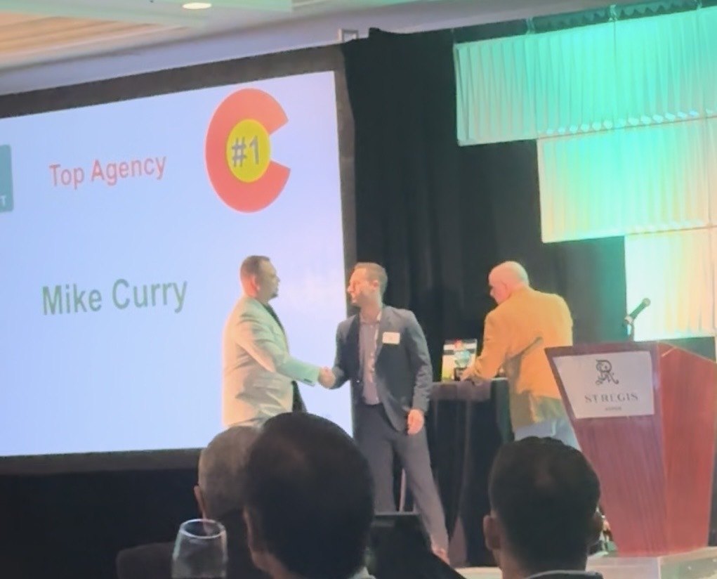 Mike Curry accepting the #1 Top Agency award